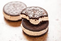 Ice cream sandwich Oreo - chocolate flavoured sandwich biscuits filled with vanilla flavour ice cream with crushed biscuit stock image Ice cream sandwich Oreo - chocolate flavoured sandwich biscuits filled with vanilla flavour ice cream with crushed biscuit stock image