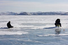 Ice fishing on Lake Baikal in the winter. royalty free stock image Ice fishing on Lake Baikal in the winter. royalty free stock image