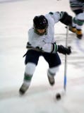 Ice hockey player action blur