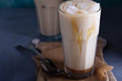 Iced coffee with milk in tall glasses royalty free stock photography Iced coffee with milk in tall glasses royalty free stock photography