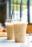 Iced coffee in plastic glass at coffee shop royalty free stock photography Iced coffee in plastic glass at coffee shop royalty free stock photography