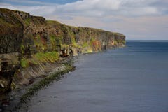 Icelandic landscape. Colorful cliffs on the west coast of peninsula Skagi. stock images Icelandic landscape. Colorful cliffs on the west coast of peninsula Skagi. stock images