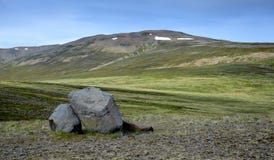 Icelandic landscape. A hill with some rocks in front on peninsula Skagi royalty free stock photos Icelandic landscape. A hill with some rocks in front on peninsula Skagi royalty free stock photos