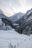 Idyllic alpine snowy mountain view in sunset sky, julian alps, Slovenia Royalty Free Stock Photo Idyllic alpine snowy mountain view in sunset sky, julian alps, Slovenia Royalty Free Stock Photo