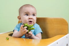 Il bambino non gradisce i broccoli Fotografia Stock Libera da Diritti Il bambino non gradisce i broccoli Fotografia Stock Libera da Diritti