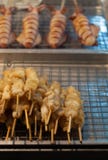 Il calamaro, seppia, grigliata ha affettato per la vendita dell'alimento tailandese della via fotografia stock libera da diritti Il calamaro, seppia, grigliata ha affettato per la vendita dell'alimento tailandese della via fotografia stock libera da diritti
