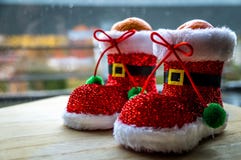 Il Natale sano tratta Mandarino in scarpa di Santa fotografia stock libera da diritti Il Natale sano tratta Mandarino in scarpa di Santa fotografia stock libera da diritti