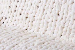 il plaid bianco grande tricotta coperta tricottata treccia di struttura fotografia stock il plaid bianco grande tricotta coperta tricottata treccia di struttura fotografia stock