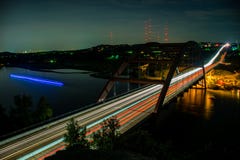 Il tramonto ad ovest della curvatura del fiume Colorado del ponte di Austin 360 accende andare Fotografie Stock Libere da Diritti Il tramonto ad ovest della curvatura del fiume Colorado del ponte di Austin 360 accende andare Fotografie Stock Libere da Diritti