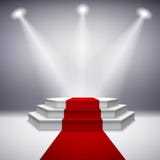 Illuminated stage podium with red carpet