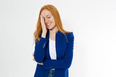 Image of attractive stylish red hair woman in blue style suit making facepalm, holding hand on eye and smiling, coming to terms royalty free stock photos Image of attractive stylish red hair woman in blue style suit making facepalm, holding hand on eye and smiling, coming to terms royalty free stock photos