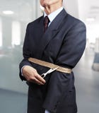 Image of businessman trying to get rid of fetters Stock Image Image of businessman trying to get rid of fetters Stock Image