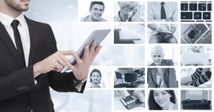 Image composée de mi section d'un homme d'affaires utilisant le PC numérique de comprimé images libres de droits Image composée de mi section d'un homme d'affaires utilisant le PC numérique de comprimé images libres de droits