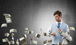 Image conceptuelle de jeune homme d'affaires photographie stock Image conceptuelle de jeune homme d'affaires photographie stock