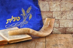 Image of shofar (horn) and prayer case with word talit (prayer) writen on it. room for text. rosh hashanah (jewish holiday) stock photos Image of shofar (horn) and prayer case with word talit (prayer) writen on it. room for text. rosh hashanah (jewish holiday) stock photos