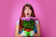 Image of surprised woman with chrysanthemums