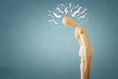 image of wooden dummy with worried stressed thoughts. depression, obsessive compulsive, adhd, anxiety disorders concept. royalty free stock photo image of wooden dummy with worried stressed thoughts. depression, obsessive compulsive, adhd, anxiety disorders concept. royalty free stock photo