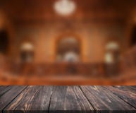Image of wooden table in front of abstract blurred background of interior. can be used for display or montage your products. Mock royalty free stock photo Image of wooden table in front of abstract blurred background of interior. can be used for display or montage your products. Mock royalty free stock photo