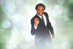 Imagem composta do homem de negócios feliz com punho Foto de Stock Imagem composta do homem de negócios feliz com punho Foto de Stock