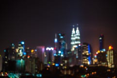 Imagem de borrão da cidade de Kuala Lumpur, forma do bokeh da estrela foto de stock royalty free Imagem de borrão da cidade de Kuala Lumpur, forma do bokeh da estrela foto de stock royalty free