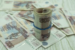 Ime jest pieniądze Hourglass i stos Rosyjski pieniądze zdjęcia stock Ime jest pieniądze Hourglass i stos Rosyjski pieniądze zdjęcia stock
