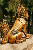 Gilded unicorn sit in the Imperial Garden of the Forbidden City. View from the back. Beijing royalty free stock image Gilded unicorn sit in the Imperial Garden of the Forbidden City. View from the back. Beijing royalty free stock image