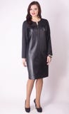 In Full Growth. Modern Woman Model In A Black Leather Dress .plus Size. Royalty Free Stock Photography In Full Growth. Modern Woman Model In A Black Leather Dress .plus Size. Royalty Free Stock Photography