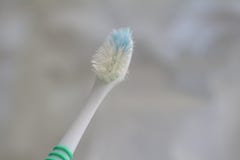 Incomplete toothbrush on a white background stock image Incomplete toothbrush on a white background stock image