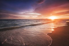Incredibly beautiful sunset on the beach in Thailand. Sun, sky, sea, waves and sand. A holiday by the sea royalty free stock photography Incredibly beautiful sunset on the beach in Thailand. Sun, sky, sea, waves and sand. A holiday by the sea royalty free stock photography