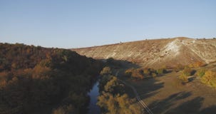Indescribable fantastic aerial view of nature , lake and mountain in amazing autumn color. stock video Indescribable fantastic aerial view of nature , lake and mountain in amazing autumn color. stock video