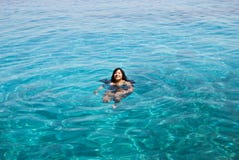 Indian Woman In Blue Sea Royalty Free Stock Photography