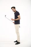 Indian boy standing with golf stick and ball. royalty free stock image Indian boy standing with golf stick and ball. royalty free stock image
