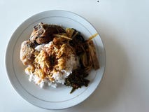 Indonesian traditional food from west sumatra. Padang and fried chicken stock photo Indonesian traditional food from west sumatra. Padang and fried chicken stock photo