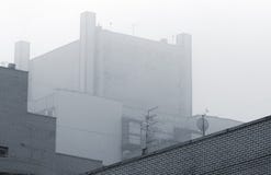 Industrial Building In Fog Stock Images