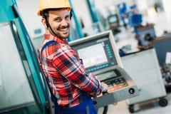 Industrial factory employee working in metal manufacturing industry Stock Photography Industrial factory employee working in metal manufacturing industry Stock Photography