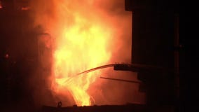 Industrial furnace fire. Metal furnace fire. Smelting metal in furnace