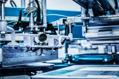Industrial metal printing machinery. royalty free stock photo Industrial metal printing machinery. royalty free stock photo