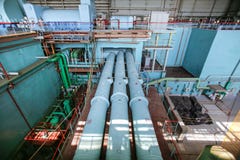 Industrial steam pipelines at power generator hall at nuclear power plant stock images Industrial steam pipelines at power generator hall at nuclear power plant stock images