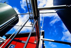 Industrial Steel tanks stairs against blue sky Stock Image Industrial Steel tanks stairs against blue sky Stock Image