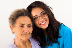 Infermiere preoccupantesi del membro della famiglia fotografia stock Infermiere preoccupantesi del membro della famiglia fotografia stock