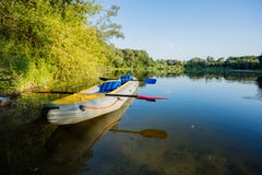 Inflatable boat on the Bank of the river. Royalty Free Stock Images Inflatable boat on the Bank of the river. Royalty Free Stock Images