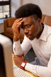 Nice tired man needing a rest from work stock image Nice tired man needing a rest from work stock image
