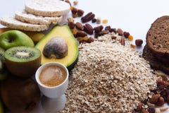 Ingredients for healthy breakfast. Fruits, oatmeal, nuts, avocado, crisp breads, on white background. royalty free stock photo Ingredients for healthy breakfast. Fruits, oatmeal, nuts, avocado, crisp breads, on white background. royalty free stock photo