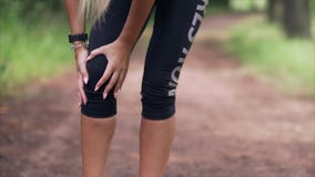 Injury of a knee on a run in a runner
