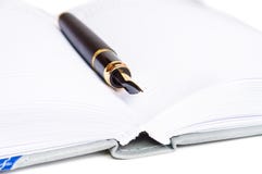 Ink Pen And A Notebook Royalty Free Stock Photo