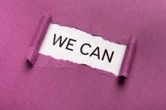 We can inscription on white background appearing behind torn purple paper royalty free stock photography We can inscription on white background appearing behind torn purple paper royalty free stock photography