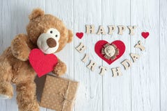 Inscription Happy Birthday. Toy Bear, Boxes With Gifts And A Congratulatory Inscription Happy Birthday. Birthday Stock Images Inscription Happy Birthday. Toy Bear, Boxes With Gifts And A Congratulatory Inscription Happy Birthday. Birthday Stock Images