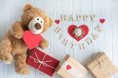 Inscription Happy Birthday. Toy Bear, Boxes With Gifts And A Congratulatory Inscription Happy Birthday. Birthday Greeting Card Royalty Free Stock Photography