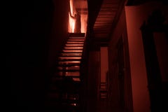 Inside Of Old Creepy Abandoned Mansion. Silhouette Of Horror Ghost Standing On Castle Stairs To The Basement. Spooky Dungeon Stone Stock Images