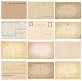 Insieme di varie vecchie cartoline d'annata isolate su bianco fotografia stock Insieme di varie vecchie cartoline d'annata isolate su bianco fotografia stock